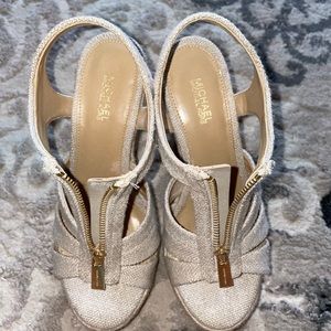 Cream Michael Kors wedges with gold zippers